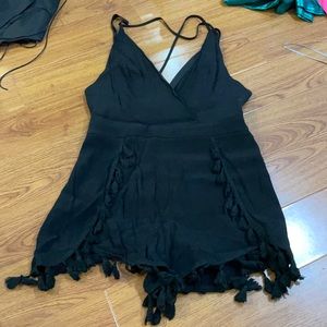 Black romper with tassels
